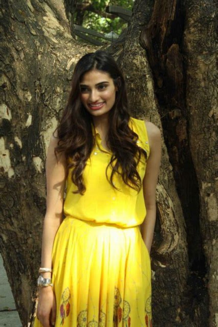 Actress Athiya Shetty Beautiful and Looking Hot in Yellow Dress