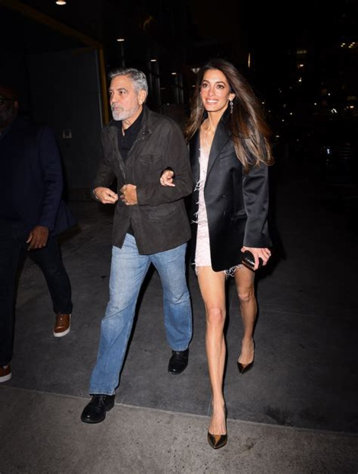 Amal Clooney Stuns in Pink Feather Minidress for Date Night With