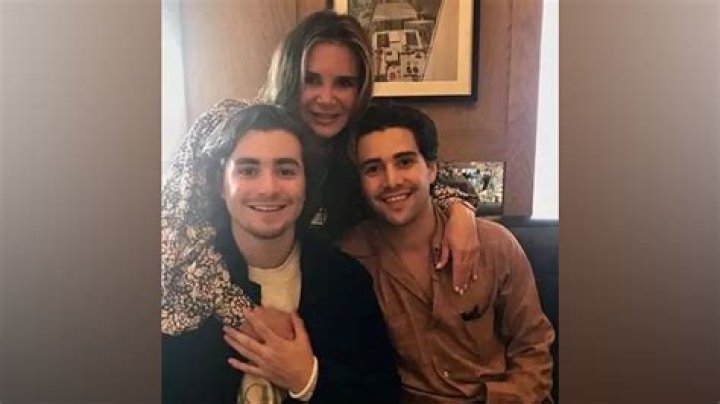 Fabien Frankel with his mother Caroline Besson and brother Max Mark Frankel