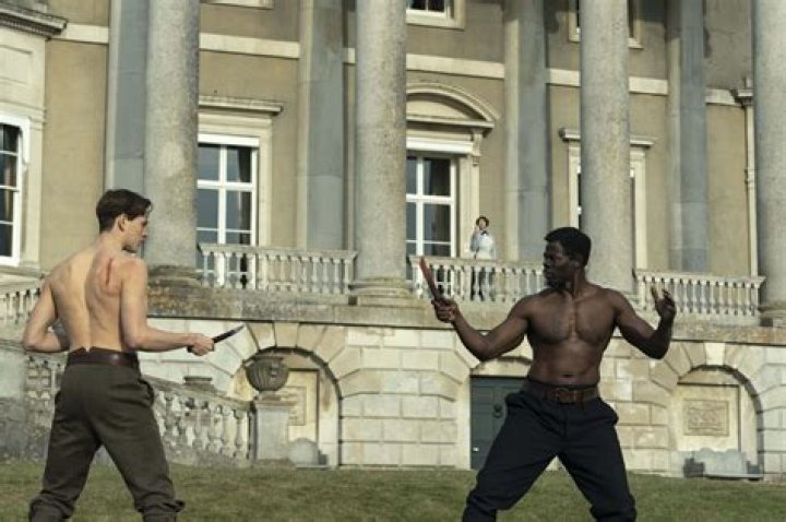 Harris Dickinson with Djimon Hounsou, Ralph Fiennes and Rhys Ifans