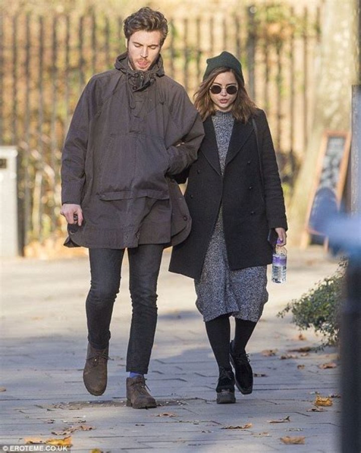 Jenna Coleman is pictured kissing boyfriend Tom Hughes for the first time