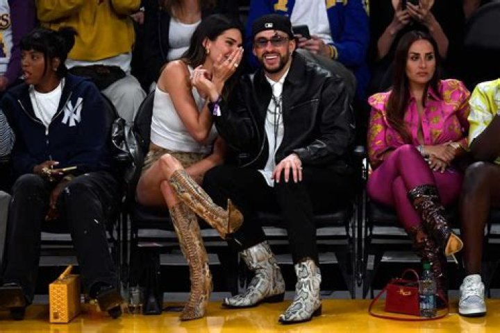 Kendall Jenner and Bad Bunny share rare PDA as they kiss at Drake concert (video)