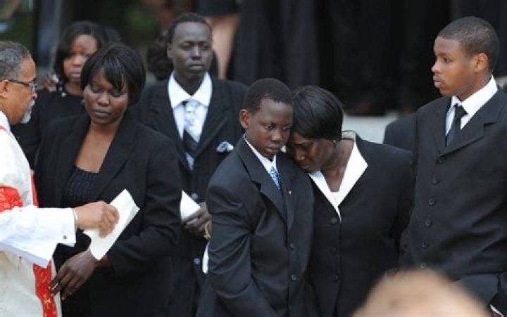 Manute Bol is Married to Wife Ajok Geng Wol. Kids Madut, Bol, Chris