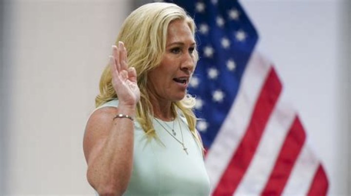 officials rule that Marjorie Taylor Greene can remain on the