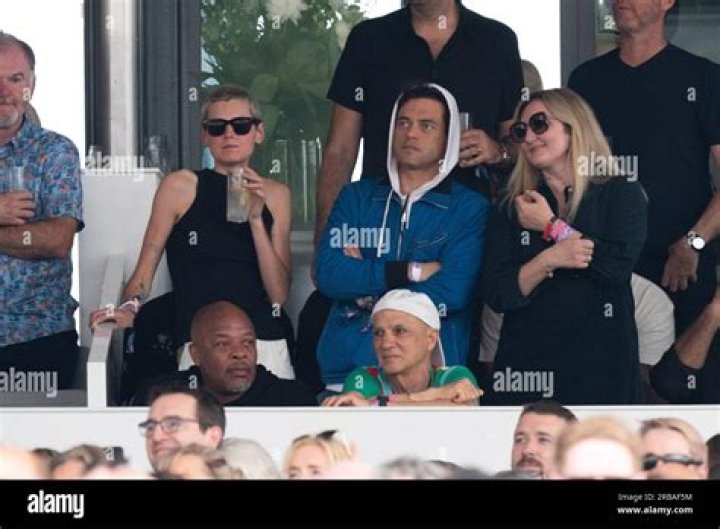 Rami Malek and L&eacute;a Seydoux Smile with Their Arms Around Each Other