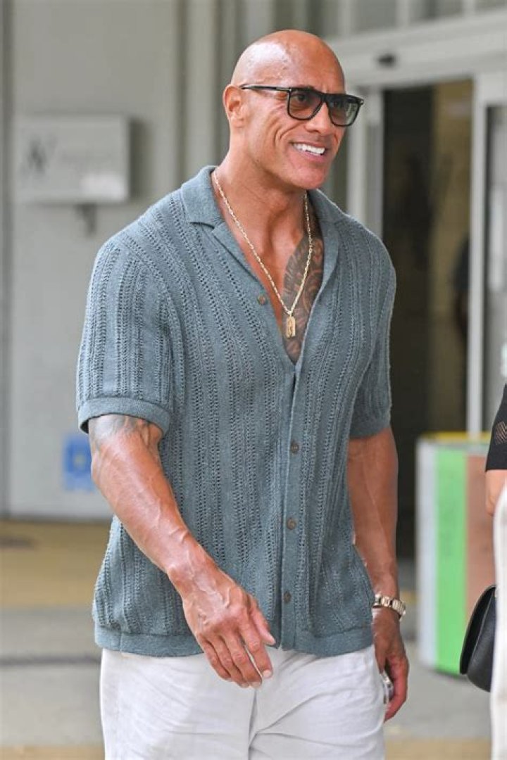 Rare photo of Dwayne Johnson and The Rock together. 9GAG