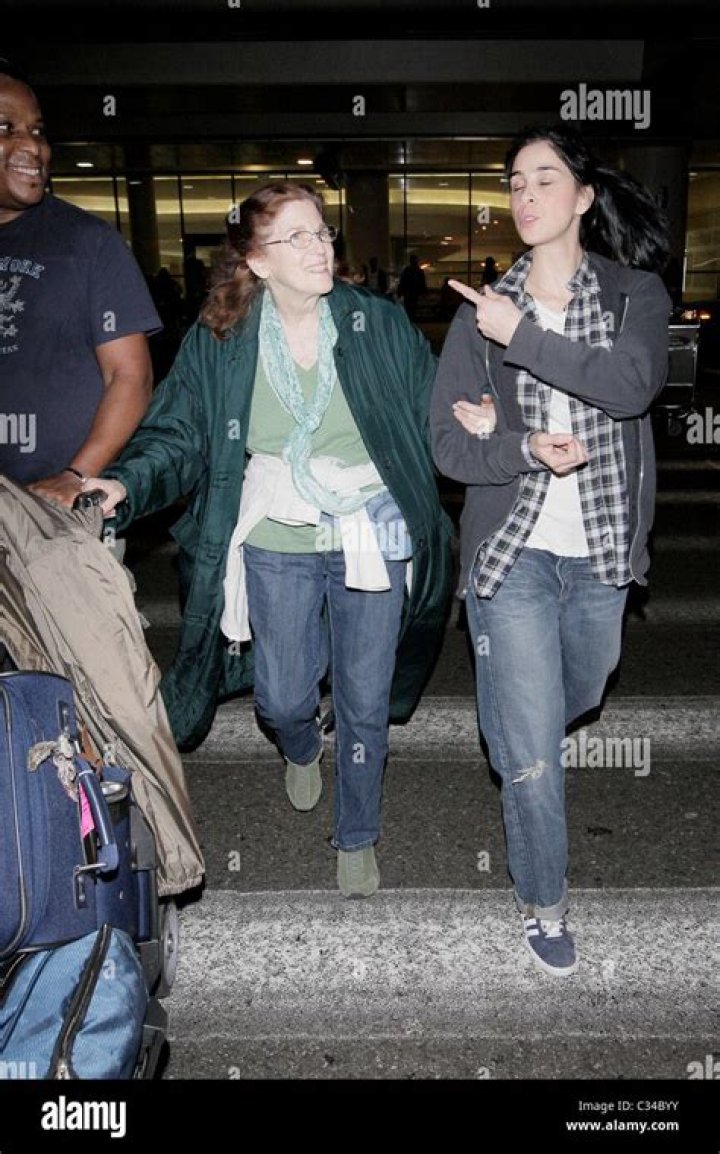 Sarah Silverman, her mother Beth Ann O'Hara, and adopted brother arrive