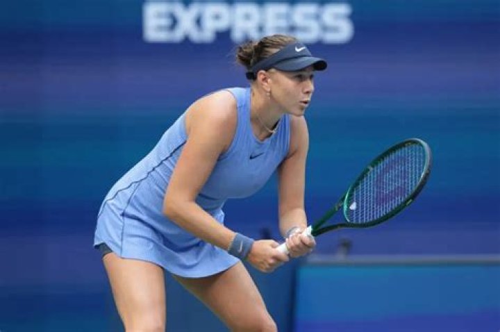 U.S. Open women's singles tennis champion Iga Swiatek poses at "Top of