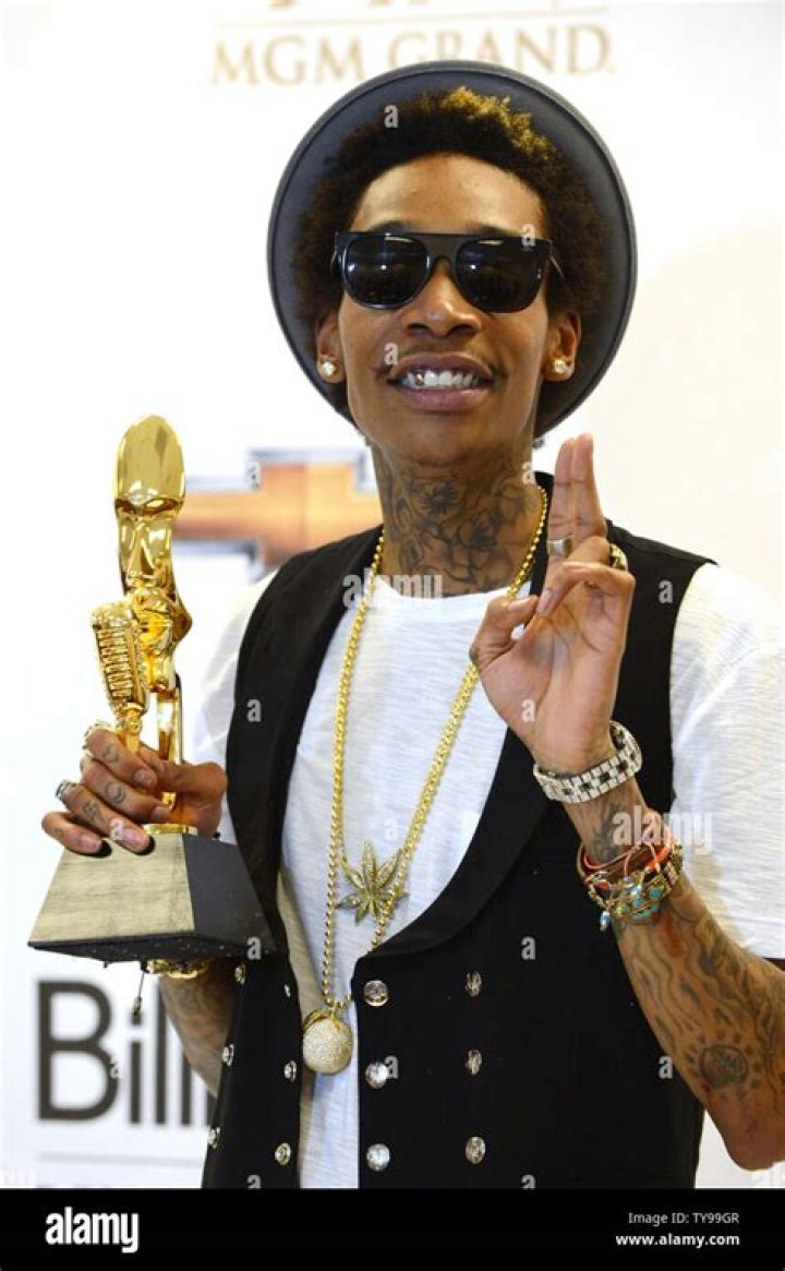 Wiz Khalifa won't deprive his son of normal childhood due to wealth